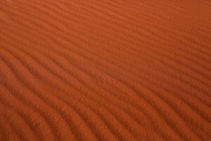 Wadi Rum Desert in Jordan. On the Sunset. Panorama of beautiful sand pattern on the dune. Desert landscape in Jordan. photo