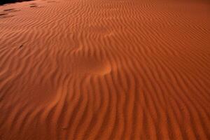 Wadi Rum Desert in Jordan. On the Sunset. Panorama of beautiful sand pattern on the dune. Desert landscape in Jordan. photo