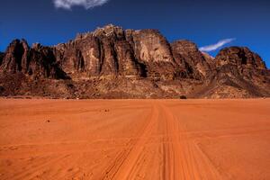 Wadi Rum Desert in Jordan. On the Sunset. Panorama of beautiful sand pattern on the dune. Desert landscape in Jordan. photo