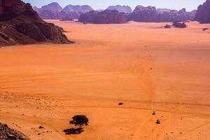 Wadi Rum Desert in Jordan. On the Sunset. Panorama of beautiful sand pattern on the dune. Desert landscape in Jordan. photo