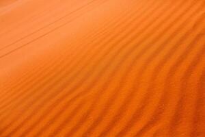 Wadi Rum Desert in Jordan. On the Sunset. Panorama of beautiful sand pattern on the dune. Desert landscape in Jordan. photo