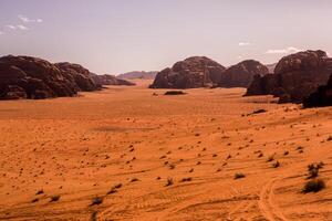 Wadi Rum Desert in Jordan. On the Sunset. Panorama of beautiful sand pattern on the dune. Desert landscape in Jordan. photo