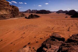 Wadi Rum Desert in Jordan. On the Sunset. Panorama of beautiful sand pattern on the dune. Desert landscape in Jordan. photo