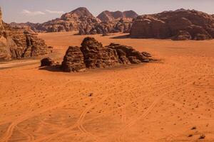 Wadi Rum Desert in Jordan. On the Sunset. Panorama of beautiful sand pattern on the dune. Desert landscape in Jordan. photo