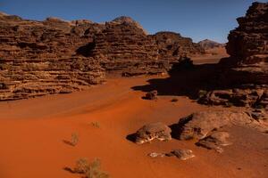 Wadi Rum Desert in Jordan. On the Sunset. Panorama of beautiful sand pattern on the dune. Desert landscape in Jordan. photo