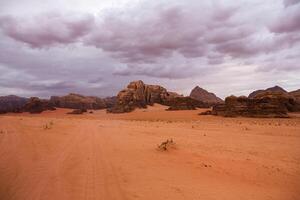 Wadi Rum Desert in Jordan. On the Sunset. Panorama of beautiful sand pattern on the dune. Desert landscape in Jordan. photo