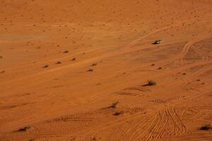 Wadi Rum Desert in Jordan. On the Sunset. Panorama of beautiful sand pattern on the dune. Desert landscape in Jordan. photo