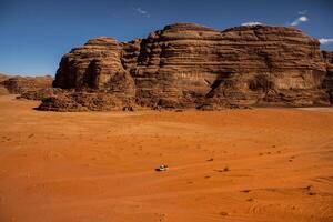 Wadi Rum Desert in Jordan. On the Sunset. Panorama of beautiful sand pattern on the dune. Desert landscape in Jordan. photo