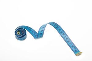 Tailor measuring tape with soft shadow photo