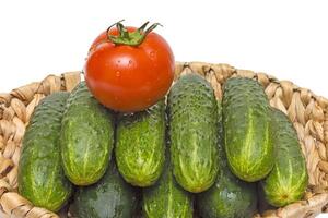 vegetables in basket on a grass photo