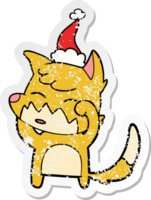 distressed sticker cartoon of a fox wearing santa hat png