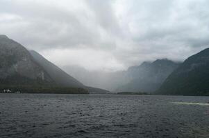 Cloudy mountain lake photo