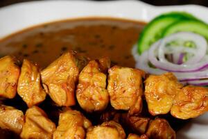 Indulge in the Beauty of Beautiful Satay, Where Skewers of Marinated Delight are Char-Grilled to Golden Perfection, Offering a Symphony of Flavor in Every Bite, a Culinary Artistry to Savor photo