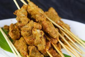 Indulge in the Beauty of Beautiful Satay, Where Skewers of Marinated Delight are Char-Grilled to Golden Perfection, Offering a Symphony of Flavor in Every Bite, a Culinary Artistry to Savor photo