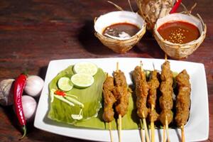 Indulge in the Beauty of Beautiful Satay, Where Skewers of Marinated Delight are Char-Grilled to Golden Perfection, Offering a Symphony of Flavor in Every Bite, a Culinary Artistry to Savor photo