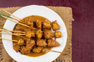 Indulge in the Beauty of Beautiful Satay, Where Skewers of Marinated Delight are Char-Grilled to Golden Perfection, Offering a Symphony of Flavor in Every Bite, a Culinary Artistry to Savor photo