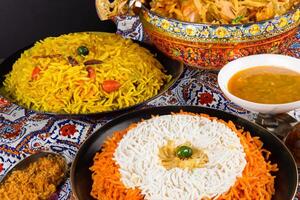 Embark on a Culinary Journey with the Exquisite Aroma and Flavorful Bliss of Kebuli Rice, a Fragrant Middle Eastern Dish Infused with Spices and Savory Perfection, Offering Gastronomic Joy. photo