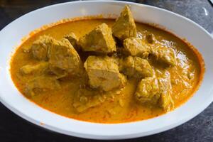 Savor the Exquisite Lamb or Beef Curry Rendang, Ready to Be Relished on Eid al-Adha, Capturing the Essence of Celebration in a Perfect Photo, Showcasing Culinary Mastery and Festive Indulgence photo