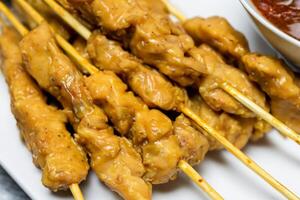 Indulge in the Beauty of Beautiful Satay, Where Skewers of Marinated Delight are Char-Grilled to Golden Perfection, Offering a Symphony of Flavor in Every Bite, a Culinary Artistry to Savor photo