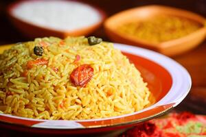 Embark on a Culinary Journey with the Exquisite Aroma and Flavorful Bliss of Kebuli Rice, a Fragrant Middle Eastern Dish Infused with Spices and Savory Perfection, Offering Gastronomic Joy. photo