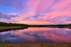 Serene Waters A Blissful Reflection of a Beautiful Pastel Lake and Sky, Where Tranquility Meets Nature's Palette, Creating a Harmonious Oasis of Soft Hues and Ethereal Beauty photo