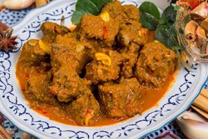 Savor the Exquisite Lamb or Beef Curry Rendang, Ready to Be Relished on Eid al-Adha, Capturing the Essence of Celebration in a Perfect Photo, Showcasing Culinary Mastery and Festive Indulgence photo