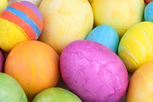 Easter Delight Reveling in the Beauty of Beautiful Easter Eggs, where Vibrant Hues Dance on Smooth Shells, Creating a Whimsical Kaleidoscope of Joy, Sprinkling Festive Cheer and Colorful Elegance photo