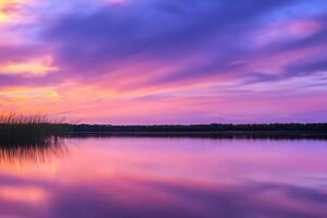 Serene Waters A Blissful Reflection of a Beautiful Pastel Lake and Sky, Where Tranquility Meets Nature's Palette, Creating a Harmonious Oasis of Soft Hues and Ethereal Beauty photo