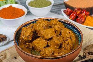 Savor the Exquisite Lamb or Beef Curry Rendang, Ready to Be Relished on Eid al-Adha, Capturing the Essence of Celebration in a Perfect Photo, Showcasing Culinary Mastery and Festive Indulgence photo