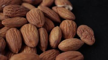 Closeup of almond, brown almonds, closeup of nut, nut background video