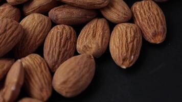 Closeup of almond, brown almonds, closeup of nut, nut background video