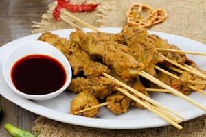 Indulge in the Beauty of Beautiful Satay, Where Skewers of Marinated Delight are Char-Grilled to Golden Perfection, Offering a Symphony of Flavor in Every Bite, a Culinary Artistry to Savor photo