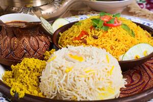 Embark on a Culinary Journey with the Exquisite Aroma and Flavorful Bliss of Kebuli Rice, a Fragrant Middle Eastern Dish Infused with Spices and Savory Perfection, Offering Gastronomic Joy. photo