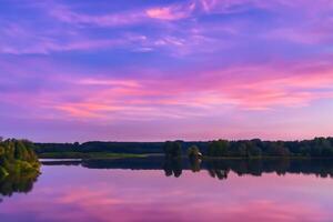 Serene Waters A Blissful Reflection of a Beautiful Pastel Lake and Sky, Where Tranquility Meets Nature's Palette, Creating a Harmonious Oasis of Soft Hues and Ethereal Beauty photo