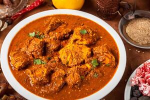 Savor the Exquisite Lamb or Beef Curry Rendang, Ready to Be Relished on Eid al-Adha, Capturing the Essence of Celebration in a Perfect Photo, Showcasing Culinary Mastery and Festive Indulgence photo