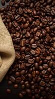 AI generated Roasted coffee beans on traditional sack textile, creating a warm background Vertical Mobile Wallpaper photo