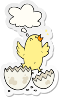 cartoon bird hatching from egg with thought bubble as a printed sticker png