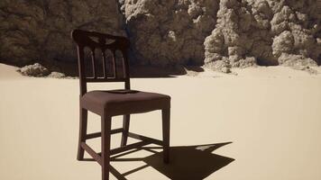 A chair that is sitting in the sand video