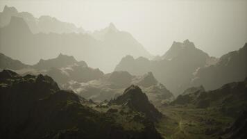 A mystical mountain range shrouded in ethereal fog video