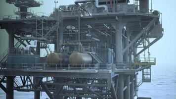 A sprawling oil refinery with numerous tanks and structures video