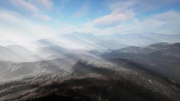 majestic mountain range illuminated by sunbeams from above video