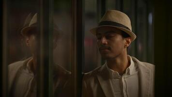 Young Man Waiting Alone at Train Station Platform at Night video