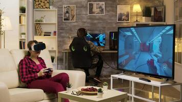 Woman experiencing virtual reality while playing video games using vr headset. Game over for female gamer.