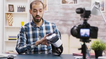 Famous influencer using virtual reality goggles while recording new episode. Creative content creator. video