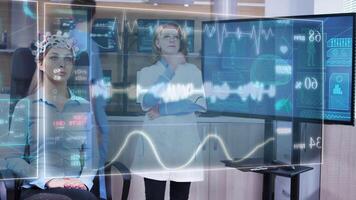 Female scietist looking at virtual hologram interface in front of her eyes and chancing the HUD displays on it with a virtual swipe video