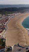 Vertical Video City of Nazare in Portugal Aerial View