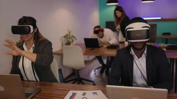 a group of office workers wearing virtual reality headset in an office video