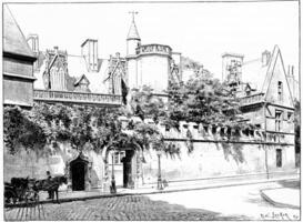 Entrance of the Hotel de Cluny, street Sommerard, vintage engraving. photo