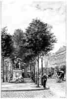 Statue Diderot on the Boulevard Saint-Germain in front of the rue Saint-Benoit, vintage engraving. photo