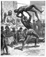 Slavery in Sudan. The winner taken off his opponent at arm's length, vintage engraving. photo